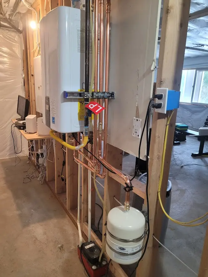 Licensed plumber repairing a kitchen sink in Dunellen